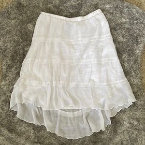 White, tiered skirt. L
